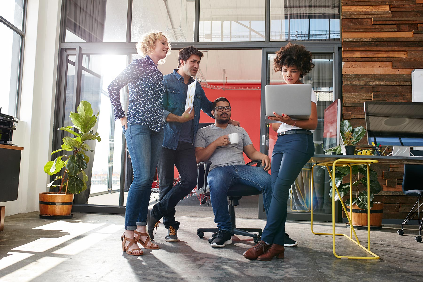 multiracial-group-of-designers-meeting-in-modern-o-PDKDT2P